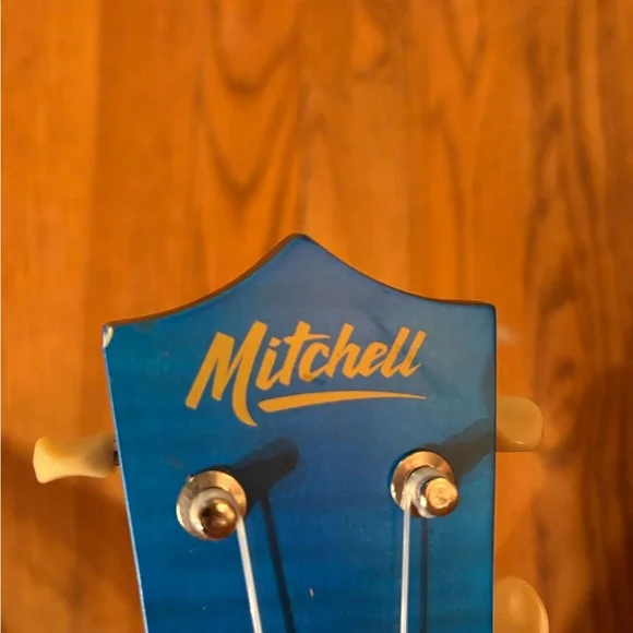 Blue Ukulele with Wooden Fretboard and case - Picture 11 of 13